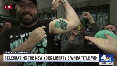 Diehard NY Liberty fan shows off logo bicep tattoo