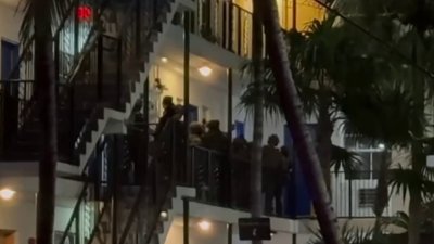 Video shows man detained at Miami Beach apartment complex after apparent barricade