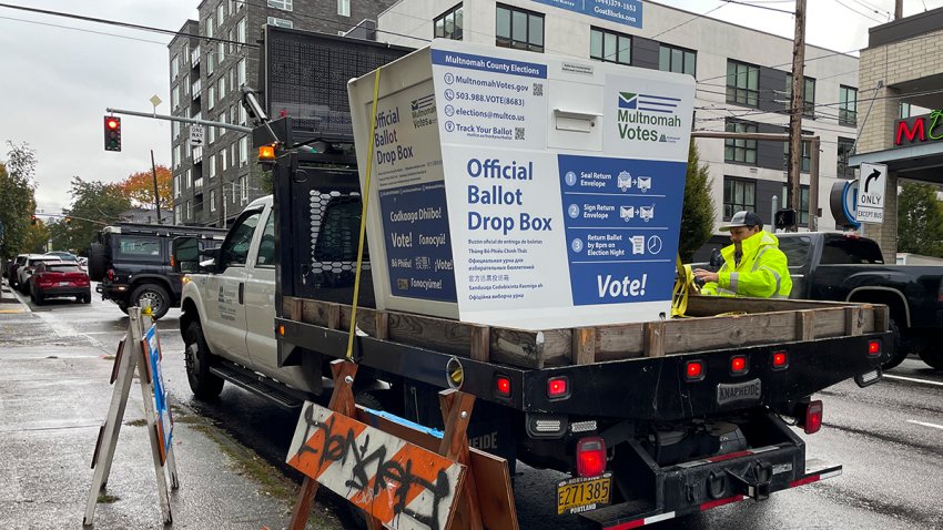 A replacement ballot drop box is unloaded on Monday, Oct. 28, 2024, in Portland, Ore.