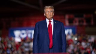 Former President Donald Trump speaks to supporters during a campaign event at Saginaw Valley State University on Thursday in Saginaw, Mich.