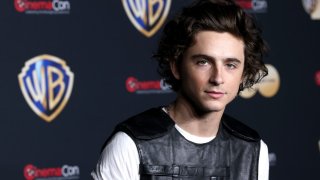 Timothee Chalamet poses for photos as he promotes the upcoming film “Dune: Part Two” during the Warner Bros. Pictures presentation at The Colosseum at Caesars Palace during CinemaCon, the official convention of the National Association of Theatre Owners, on April 25, 2023, in Las Vegas, Nevada.