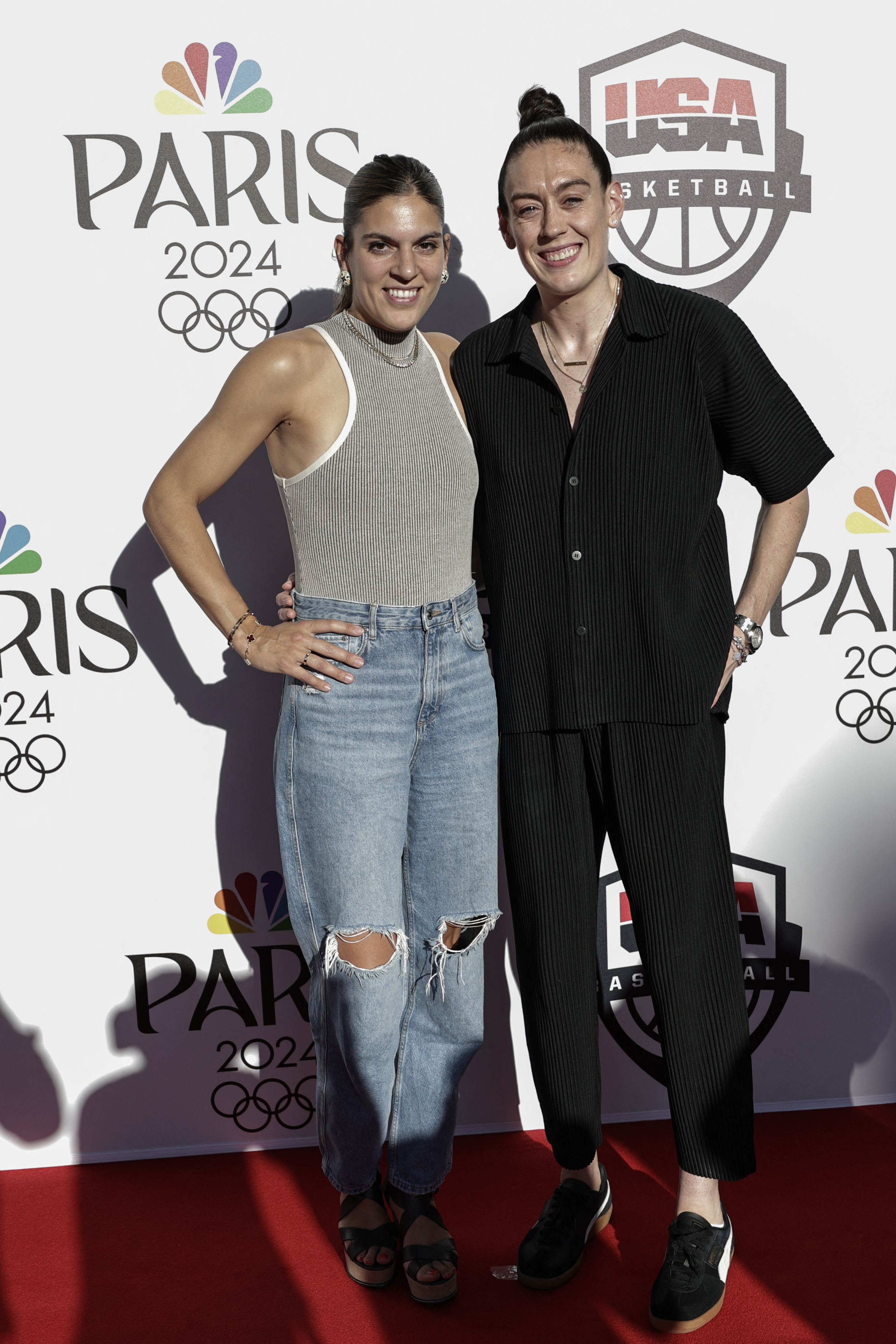 Former Spain basketball player Marta Xargay and USA’s women basketball team player Breanna Stewart pose as they arrive to attend Comcast NBCUniversal and NBA’s Celebration of U.S. Basketball in the Paris 2024 Olympics with the U.S. men and women basketball teams at the Team USA house at Palais Brongniart in Paris on Aug. 5, 2024, during the 2024 Paris Olympic Games.