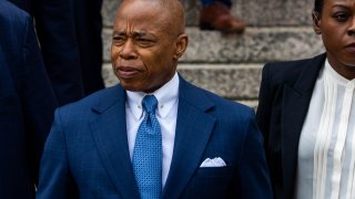 NEW YORK, NEW YORK – OCTOBER 2: Mayor Eric Adams exits the Thurgood Marshall Courthouse after making the first appearance in his corruption case on October 2, 2024 in New York City. Adams has been charged with five offenses: conspiracy to commit wire fraud, federal program bribery, solicitation of a contribution by a foreign national, wire fraud, and bribery. (Photo by Alex Kent/Getty Images)