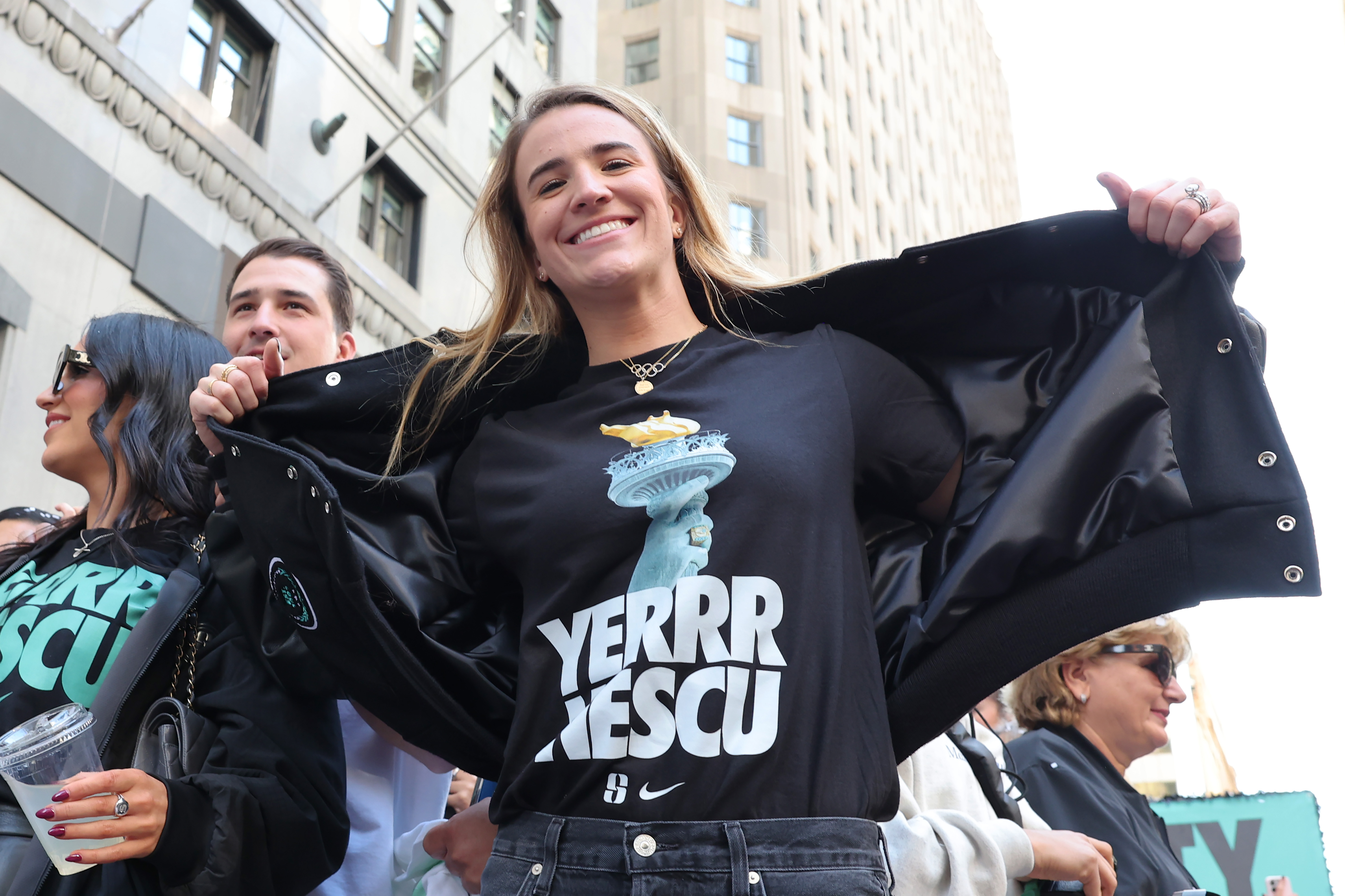 NEW YORK, NEW YORK – OCTOBER 24: New York Liberty Guard Sabrina Ionescu celebrates the team winning the WNBA championship during their parade on October 24, 2024 in New York City. Fans lined the streets north along Broadway to City Hall through what’s known as the “Canyon of Heroes” to celebrate the Liberty’s first WNBA championship after a 67-62 overtime victory on Sunday over the Minnesota Lynx. The Liberty were the top seed with a league-best 32-8 record. (Photo by Michael M. Santiago/Getty Images)