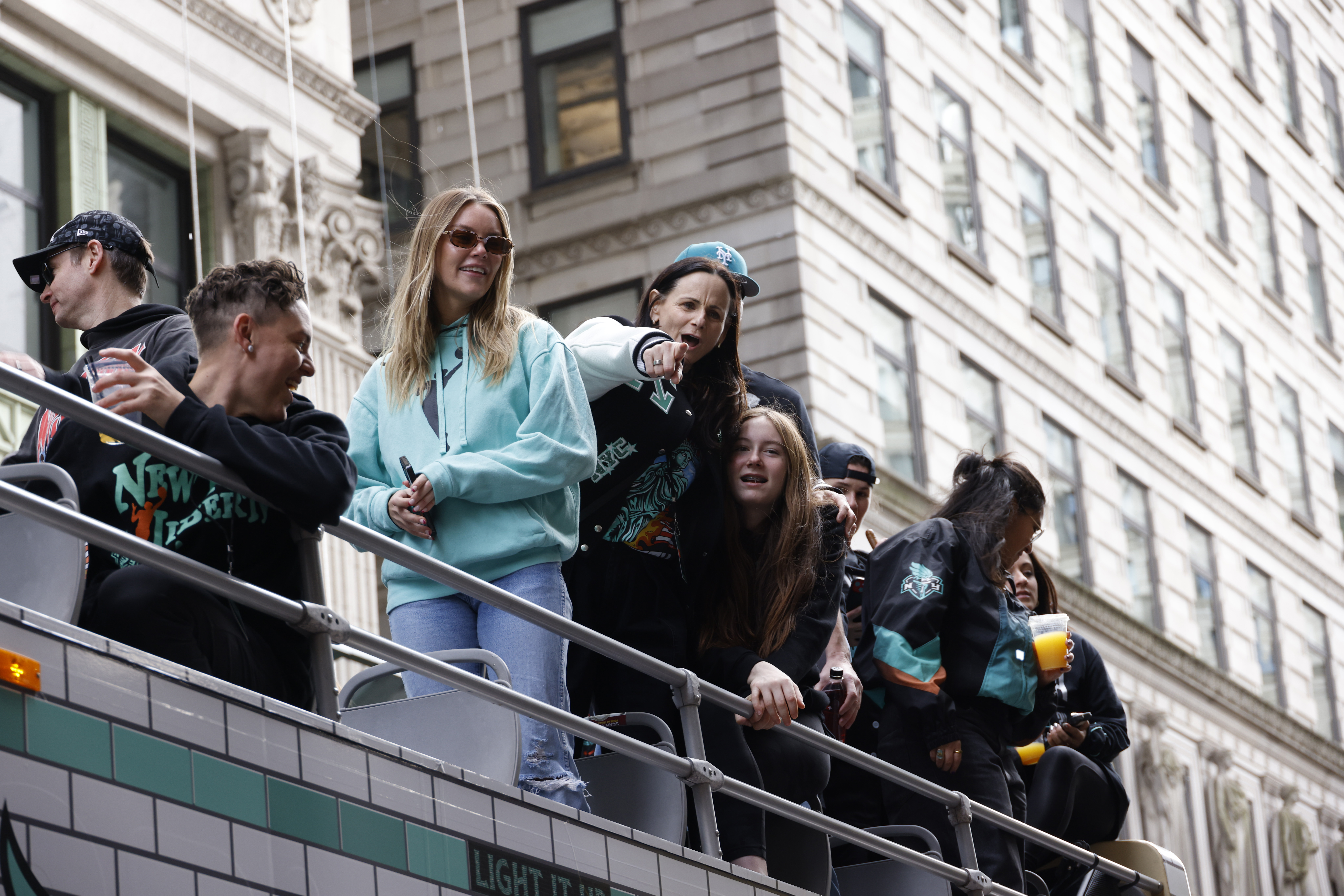 NEW YORK, NEW YORK – OCTOBER 24: Sandy Brondello (C) attends the New York Liberty Ticker Tape Victory Parade & Rally on October 24, 2024 in New York City. (Photo by Rob Kim/Getty Images)