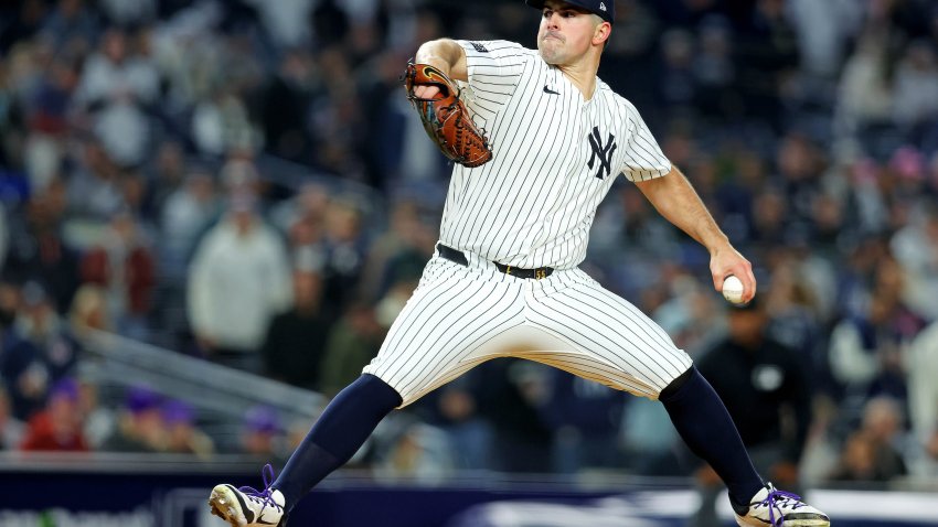 Oct 14, 2024; Bronx, New York, USA; New York Yankees pitcher Carlos Rodon (55) pitches during the first inning against the Cleveland Guardians in game one of the ALCS for the 2024 MLB Playoffs at Yankee Stadium. Mandatory Credit: Brad Penner-Imagn Images