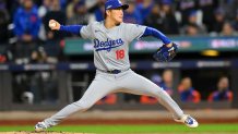 Oct 17, 2024; New York City, New York, USA; Los Angeles Dodgers pitcher Yoshinobu Yamamoto (18) throws a pitch against the New York Mets in the first inning during game four of the NLCS for the 2024 MLB playoffs at Citi Field. Mandatory Credit: John Jones-Imagn Images