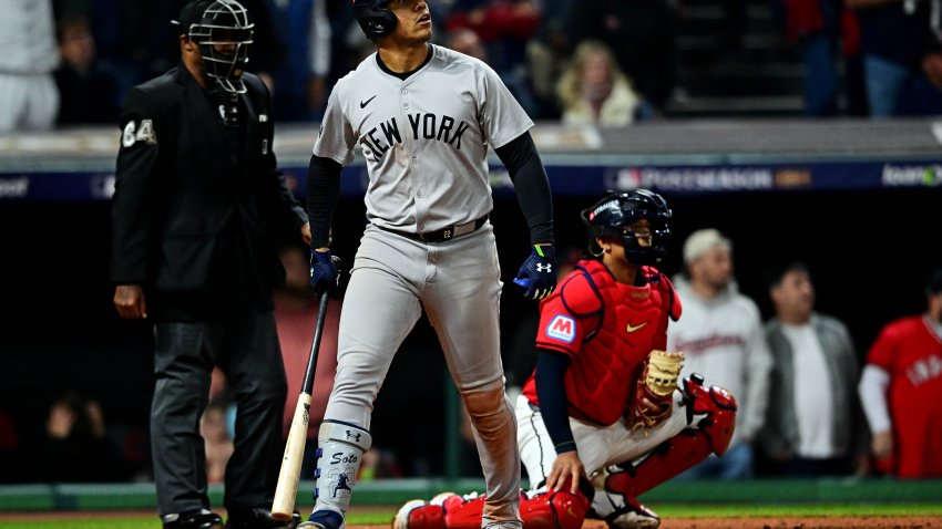 Oct 19, 2024; Cleveland, Ohio, USA; New York Yankees outfielder Juan Soto (22) celebrates after hitting a three run home run during the tenth inning against the Cleveland Guardians during game five of the ALCS for the 2024 MLB playoffs at Progressive Field. Mandatory Credit: David Dermer-Imagn Images