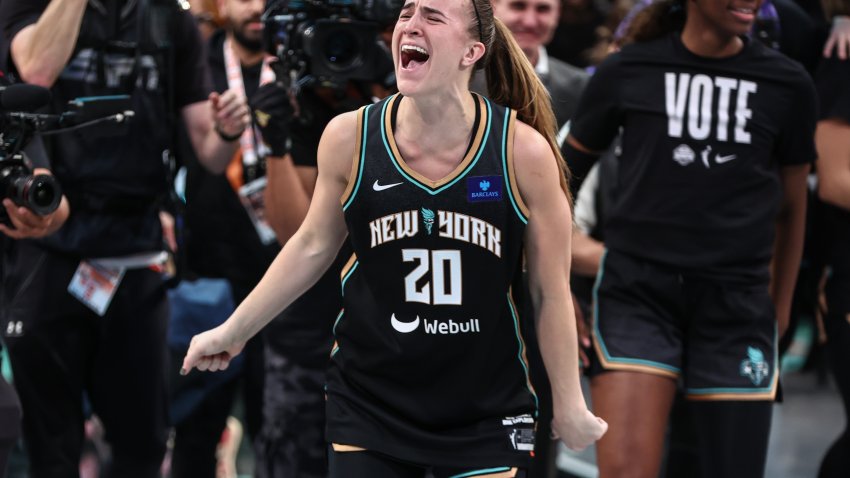 Oct 20, 2024; Brooklyn, New York, USA; New York Liberty guard Sabrina Ionescu (20) celebrates after defeating the Minnesota Lynx in game five of the 2024 WNBA Finals at Barclays Center. Mandatory Credit: Wendell Cruz-Imagn Images