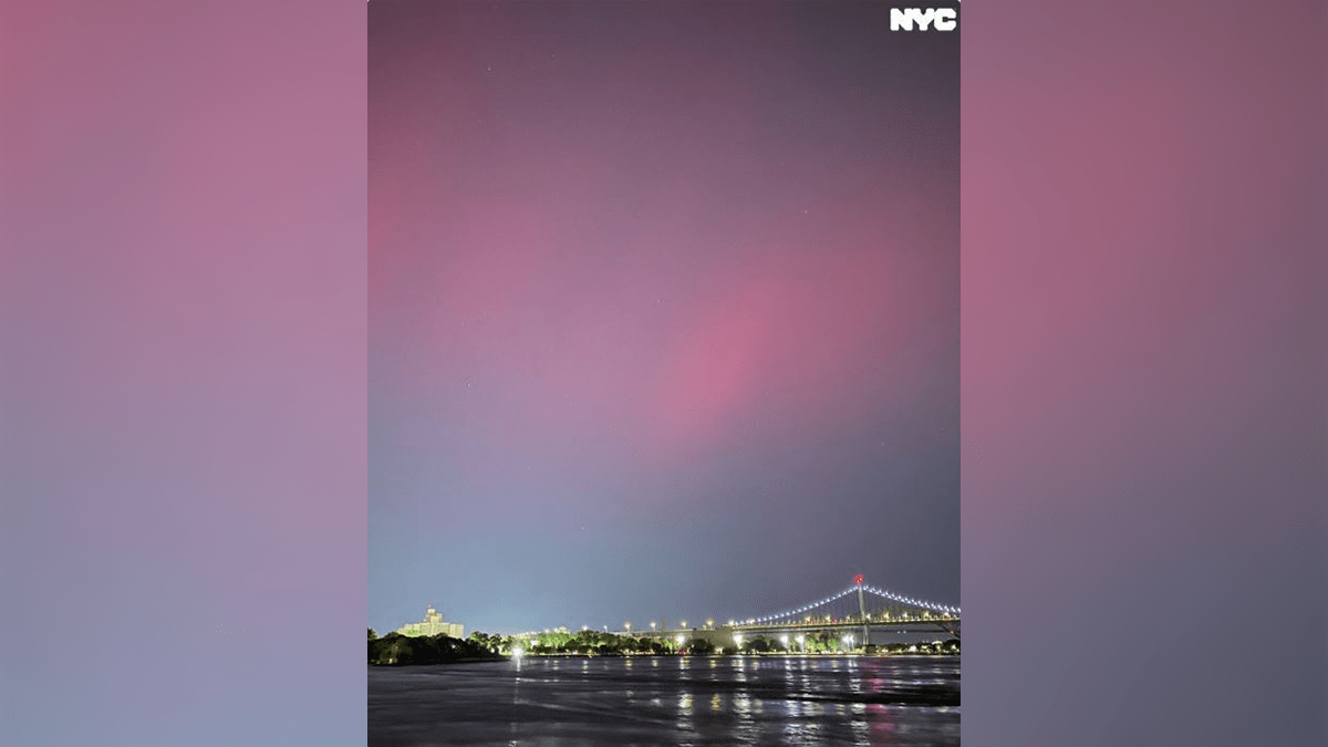 This photo posted by @nycgov on the social media platform X shows the Northern Lights behind Gracie Mansion on the Upper East Side of Manhattan.