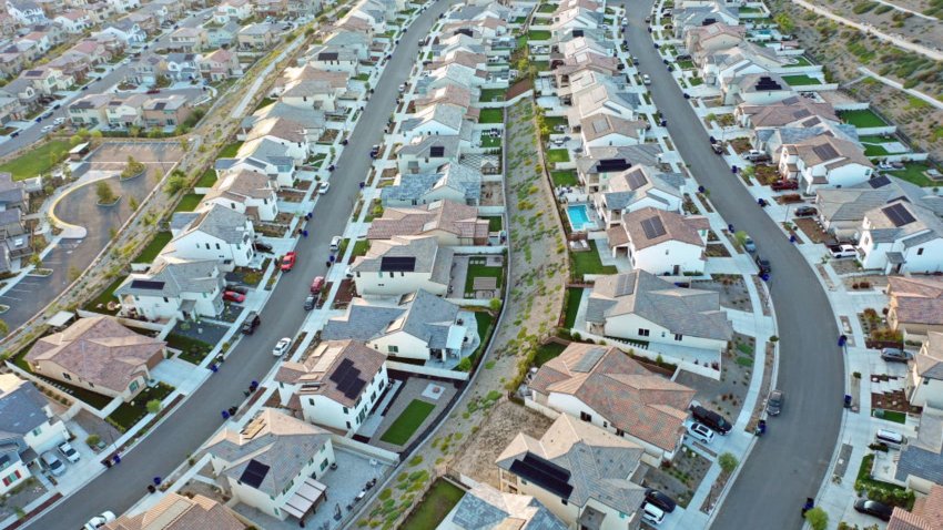 An aerial view of existing homes near new homes under construction (UPPER R) in the Chatsworth neighborhood on September 08, 2023 in Los Angeles, California. 