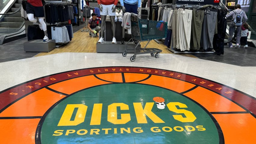 The Dick’s Sporting Goods logo is displayed on the floor of a store on September 04, 2024 in Daly City, California. 