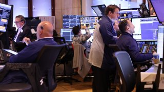 Traders work on the floor of the New York Stock Exchange during the morning trading on November 07, 2024 in New York City. 