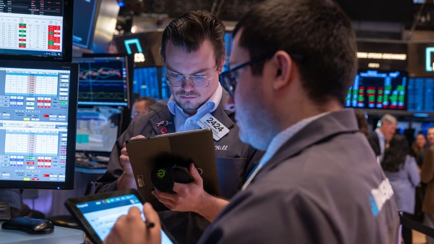 Traders work on the New York Stock Exchange (NYSE) floor on November 12, 2024 in New York City.