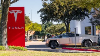 A Tesla Cybertruck is parked outside of a dealership on November 14, 2024 in Austin, Texas. 