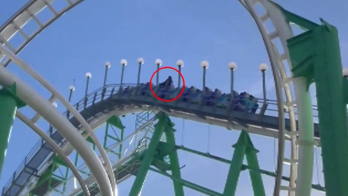 WATCH Man climbs out of roller coaster after lap bar unlatches NBC