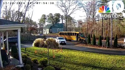 Woman arrested after narrowly missing child near school bus