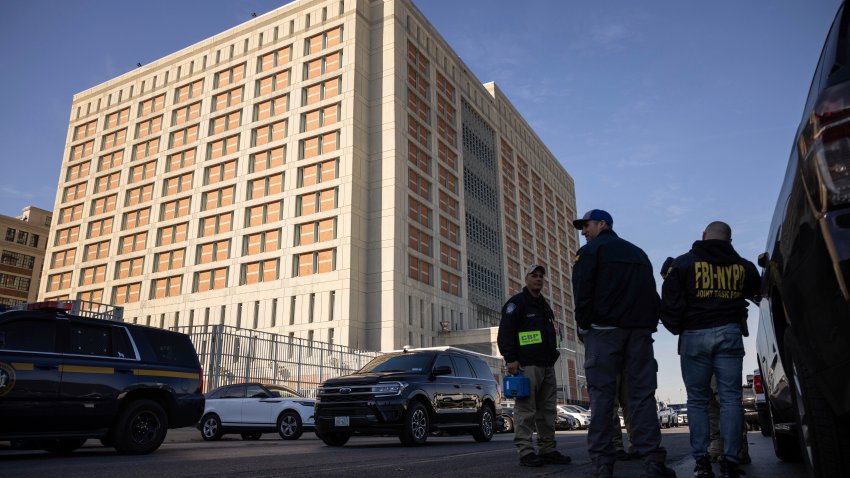 Federal enforcement officers stand outside the Metropolitan Detention Center, where Sean “Diddy” Combs is incarcerated, during an interagency operation, Monday, Oct. 28, 2024, in the Brooklyn Borough of New York.