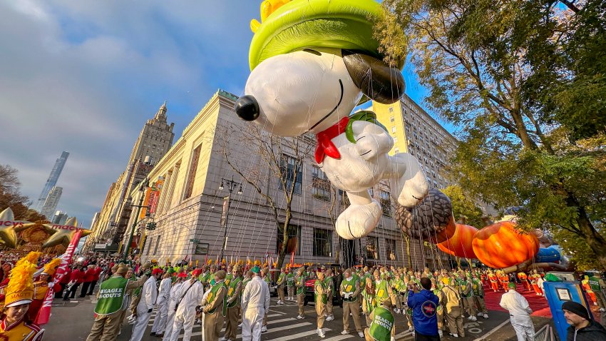 FILE – A Beagle Scout Snoopy balloon floats above Central Park West in New York during the Macy’s Thanksgiving Day Parade on Thursday, Nov. 23, 2023. (AP Photo/Ted Shaffrey, File)