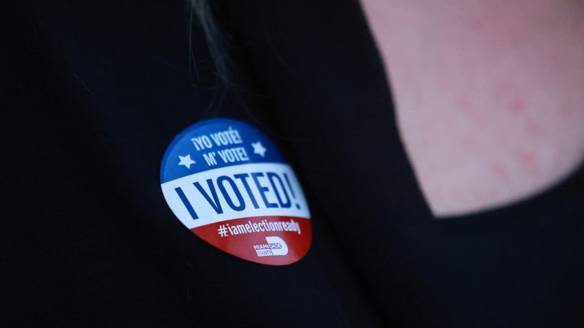 MIAMI, FLORIDA – OCTOBER 21: A person wears an ‘I Voted’ sticker after casting their ballot in a polling station as early voting begins on October 21, 2024, in Miami, Florida. Early voting runs from Oct. 21 through Nov. 3 in Miami-Dade and Broward. People head to the polls to decide, among other races, the next president of the United States. (Photo by Joe Raedle/Getty Images)