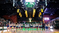 The San Jose State University Spartans line up for the national anthem and player introductions for their NCAA Mountain West women's volleyball game against the Colorado State University Rams in Fort Collins, Colo., on Oct. 3, 2024.