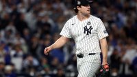 Oct 30, 2024; New York, New York, USA; New York Yankees pitcher Gerrit Cole (45) reacts after a play during the fifth inning against the Los Angeles Dodgers in game five of the 2024 MLB World Series at Yankee Stadium. Mandatory Credit: Vincent Carchietta-Imagn Images