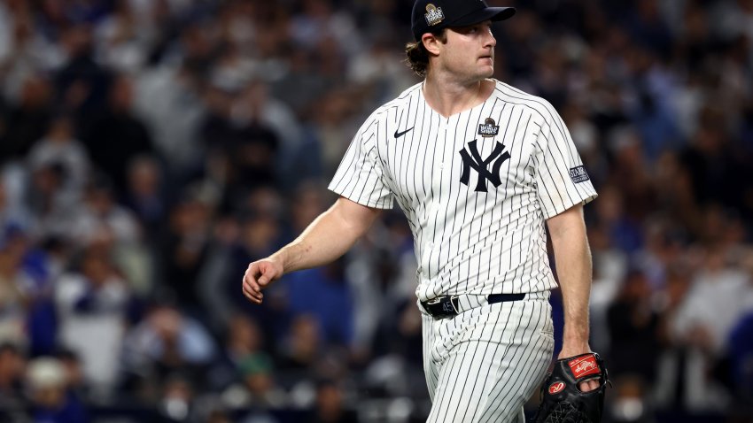 Oct 30, 2024; New York, New York, USA; New York Yankees pitcher Gerrit Cole (45) reacts after a play during the fifth inning against the Los Angeles Dodgers in game five of the 2024 MLB World Series at Yankee Stadium. Mandatory Credit: Vincent Carchietta-Imagn Images