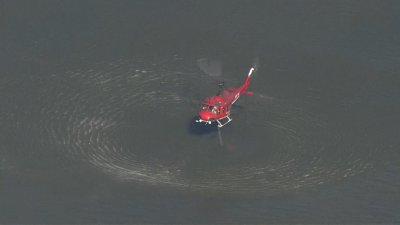 Chopper 4 flies over Englewood Cliffs fire, catches Forest Fire Service water drop