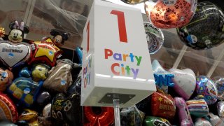 A sign in a Party City store in Miami, Florida, on Jan. 18, 2023.