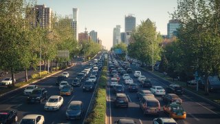 A heavy traffic jam with many cars on the road in Chaoyang district in Beijing, China.