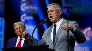 Robert F. Kennedy Jr. and Republican presidential nominee and former U.S. President Donald Trump attend a campaign event sponsored by conservative group Turning Point USA, in Duluth, Georgia, U.S., October 23, 2024.
