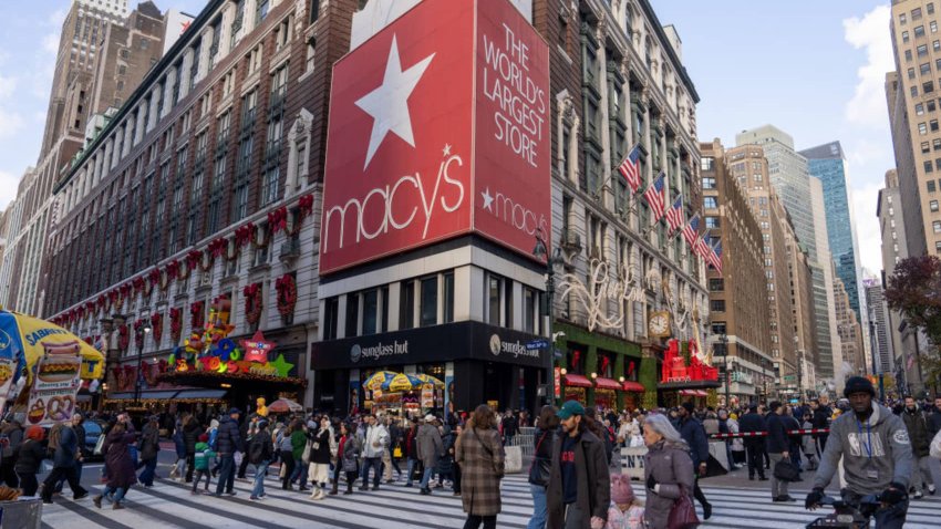 People walk past the Macy’s Herald Square flagship store on November 29, 2024 in New York City. 