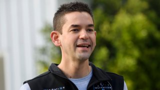 Inspiration4 mission commander Jared Isaacman, founder and chief executive officer of Shift4 Payments, stands for a portrait in front of the recovered first stage of a Falcon 9 rocket at Space Exploration Technologies Corp. (SpaceX) on February 2, 2021 in Hawthorne, California. 