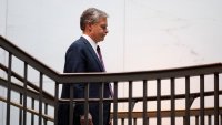 FBI Director Christopher Wray walks into a secure information area (SCIF) ahead of a closed-door security meeting on Capitol Hill in Washington on September 25, 2024.