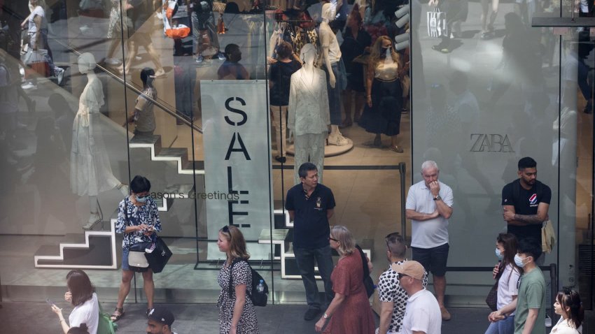 People standing outside astore at Pitt Street Mall in Sydney, New South Wales, Australia, on Boxing Day. 