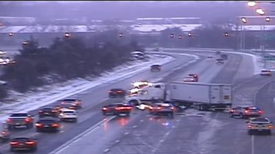 Jackknifed truck closed lanes on highway in Manchester