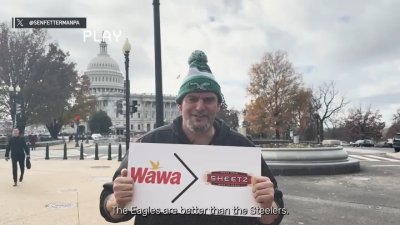 Unenthusiastic Sen. John Fetterman praises Eagles, Wawa while settling bet with Philly mayor