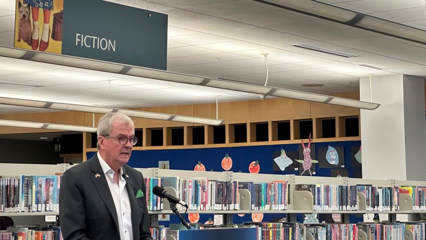 New Jersey Gov. Phil Murphy speaks at Princeton Public Library before signing legislation aimed at prohibiting school and public libraries from banning books in the state on Monday, Dec. 9, 2024.