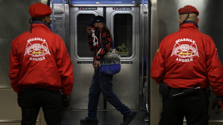 Members of the Guardian Angels on patrol.