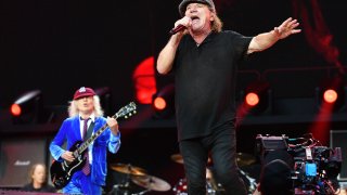 LONDON, ENGLAND – JULY 03: Brian Johnson and Angus Young of AC/DC perform during the PWR UP Tour at Wembley Stadium on July 03, 2024 in London, England.  (Photo by Jim Dyson/Getty Images)