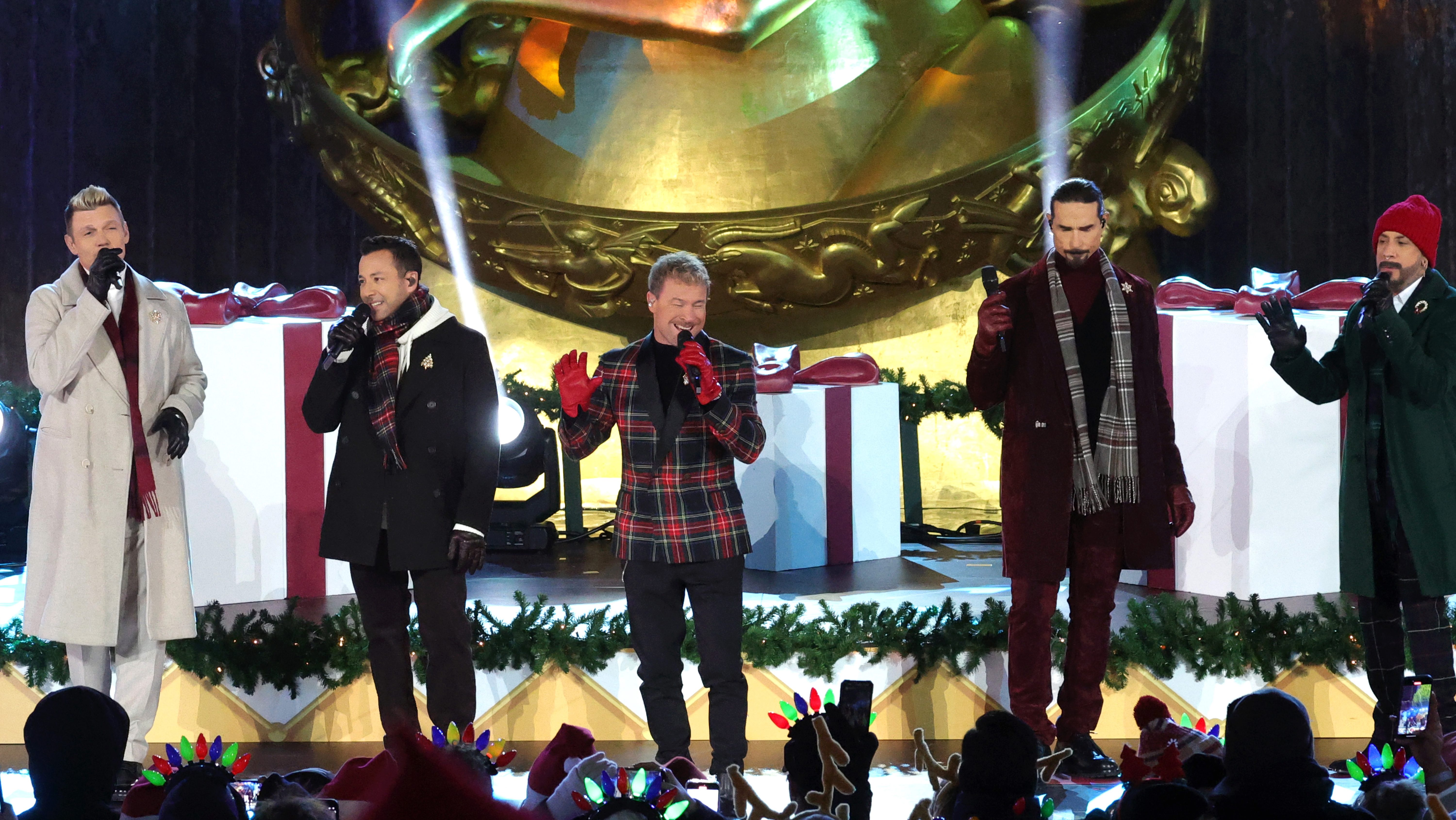 (L-R) Nick Carter, Howie Dorough, Brian Littrell, Kevin Richardson and AJ McLean of the Backstreet Boys perform during the 2024 Rockefeller Center Tree Lighting Ceremony on December 04, 2024 in New York City. (Photo by Michael Loccisano/Getty Images)