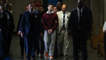 Luigi Nicholas Mangione (C) arrives at Manhattan Criminal Court in New York on December 23, 2024. Mangione, 26, is accused of shooting UnitedHealthcare chief executive Brian Thompson on a Manhattan street on December 4. (Photo by CHARLY TRIBALLEAU / AFP) (Photo by CHARLY TRIBALLEAU/AFP via Getty Images)