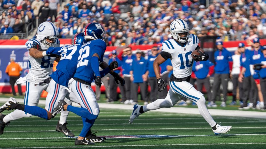 Indianapolis Colts wide receiver Adonai Mitchell (10) runs with the ball after a catch during a game between New York Giants and Indianapolis Colts at MetLife Stadium on Sunday, Dec. 29, 2024.