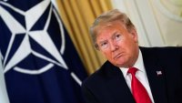 U.S. President Donald Trump attends a meeting with NATO Secretary General Jens Stoltenberg ahead of the NATO summit in Watford, in London, Britain, December 3, 2019.