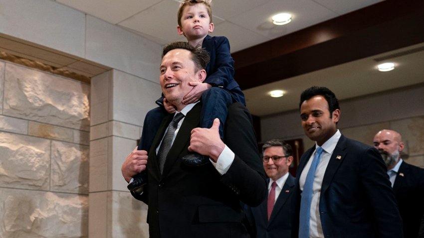 From left, Elon Musk, House Speaker Mike Johnson and Vivek Ramaswamy arrive for a meeting on Capitol Hill on Dec. 5, 2024.