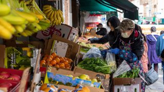 Shoppers at a produce store in the Chinatown district of San Francisco, California, U.S., on Monday, Jan. 6, 2025.