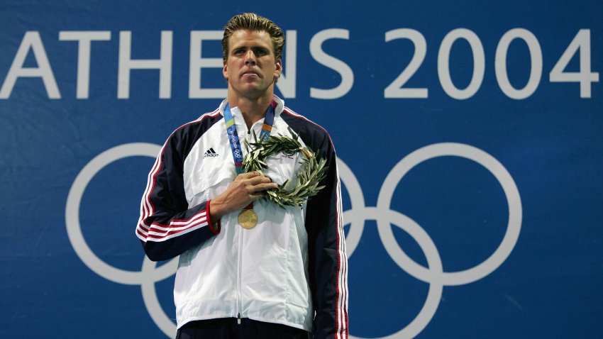 Gary Hall Jr. of the United States stands on the medal stand