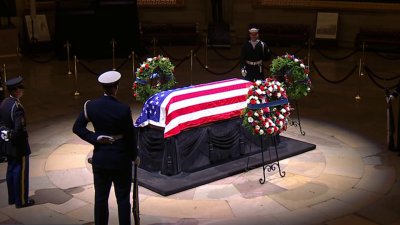 Jimmy Carter lies in state at US Capitol as public weathers cold to pay respects