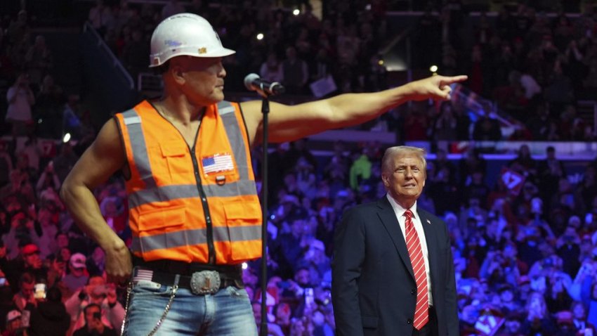President-elect Donald Trump dances with The Village People at a rally ahead of the 60th Presidential Inauguration, Sunday, Jan. 19, 2025, in Washington. (AP Photo/Evan Vucci)