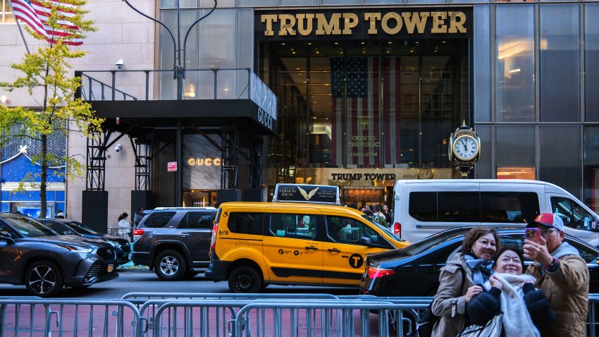 People take photographs in front of The Trump Tower on Fifth Avenue in New York City on November 12, 2024. (Photo by Charly TRIBALLEAU / AFP) (Photo by CHARLY TRIBALLEAU/AFP via Getty Images)